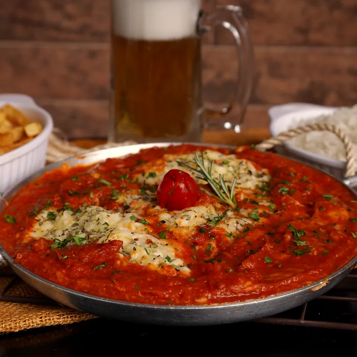 Parmegiana gratinada com molho de tomate