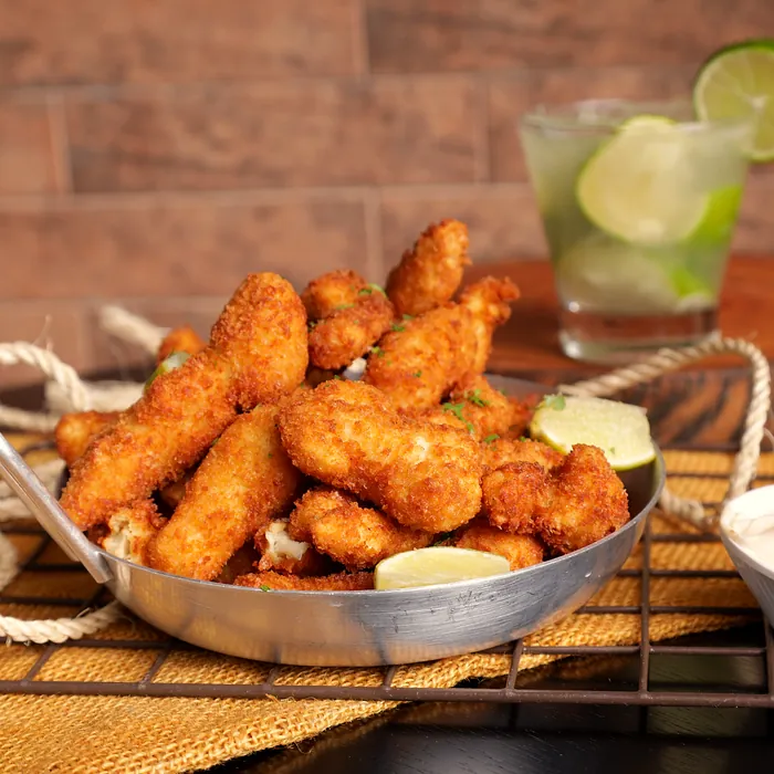 Frango à passarinho com caipirinha